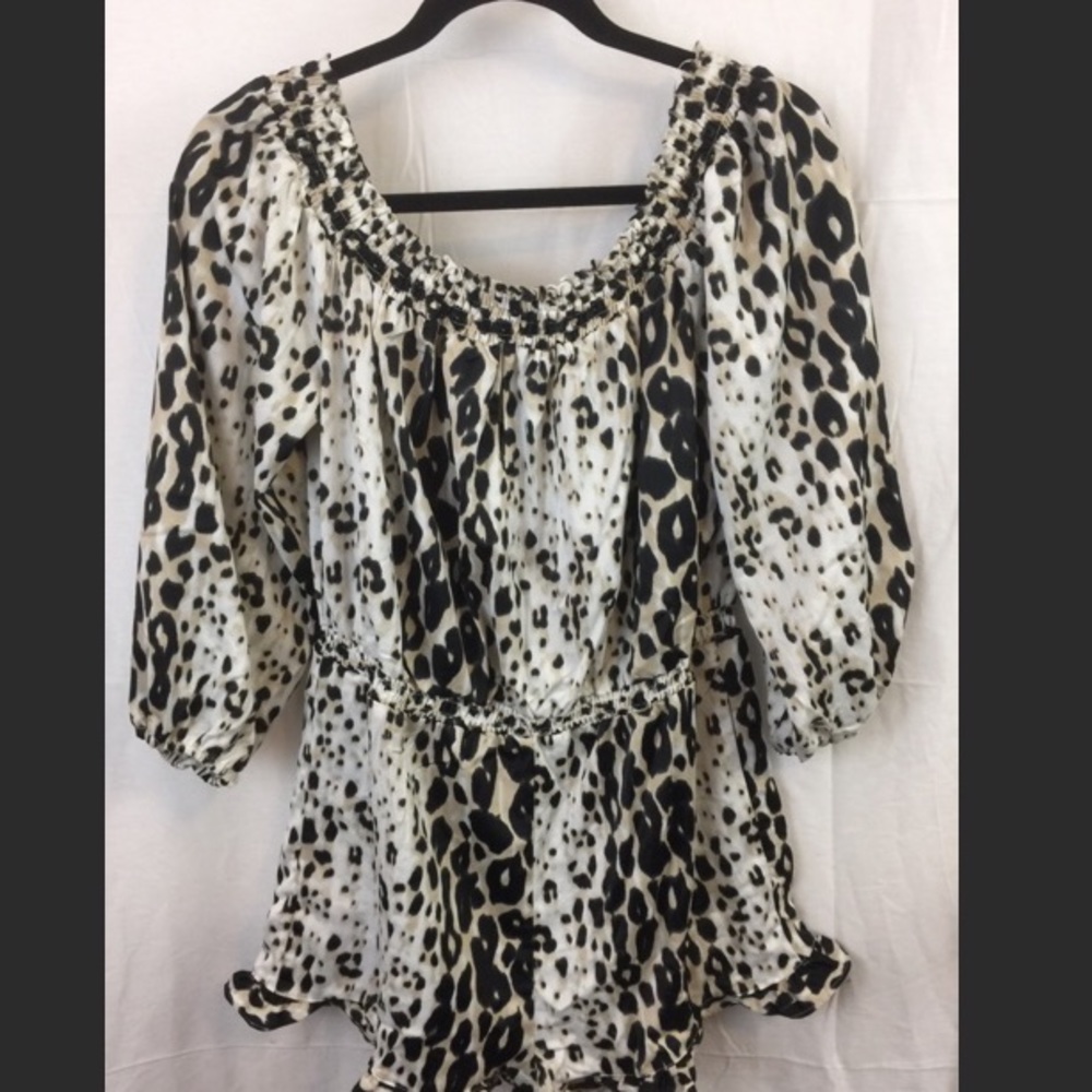 Bebe off the shoulder ruffle romper